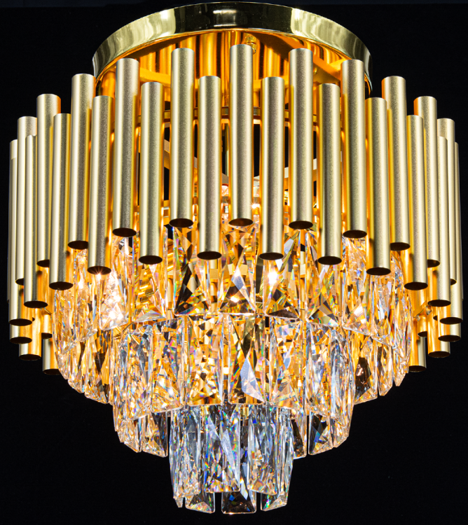 Żyrandol kryształowy BARI 4xE14 złoty Glamour 6230/4B TR to elegancka plafoniera z metalu i przezroczystych kryształów. Średnica 39 cm, wysokość 38 cm, 4xE14 40W, IP20. Idealna do salonu, sypialni i wnętrz w stylu glamour. Gwarancja 2 lata