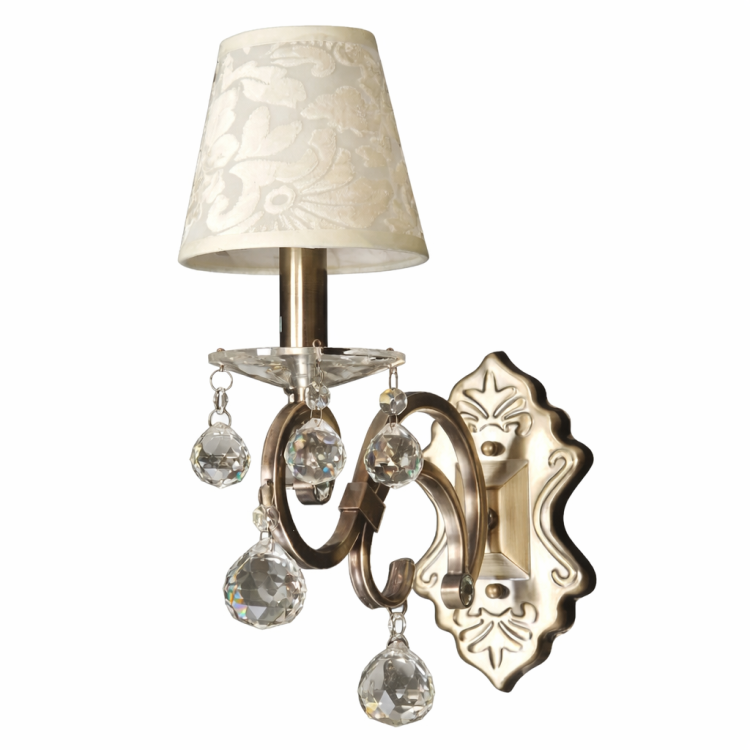 Kinkiet kryształowy FLORENCE 1xE14 w kolorze patyny to eleganckie oświetlenie ścienne z abażurem ecru i dekoracyjnymi kryształami. Idealny do sypialni, salonu lub korytarza w stylu glamour i klasycznym.