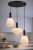 GATER 3xE27 Italux to stylowa lampa sufitowa z regulowaną wysokością do 140 cm. Kaskadowe zawieszenie i mleczne klosze ze szkła opalowego doskonale rozświetlą salon, jadalnię lub reprezentacyjny przedpokój.