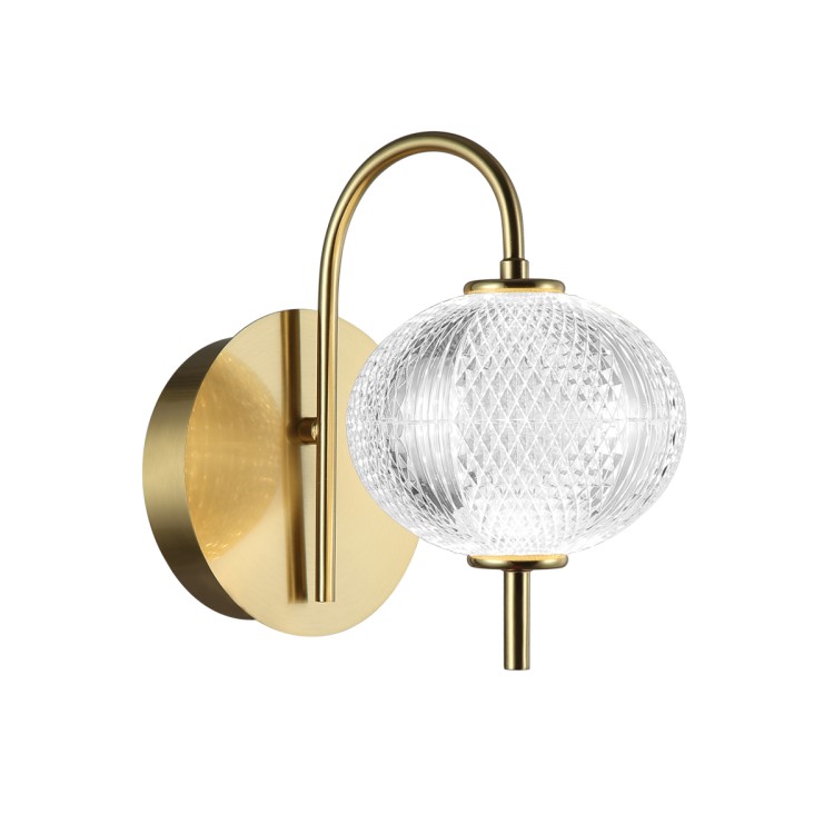 Kinkiet Lazie WL-29038-1-GD Italux to eleganckie oświetlenie ścienne LED w złotym kolorze. Przezroczysty, zdobiony klosz i ciepłe światło 3000K tworzą przytulny klimat w salonie, sypialni lub holu.