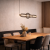 Nowoczesna lampa MARCO LED 16W Italux to stylowe oświetlenie nad stół. Czarna forma z mosiężnymi detalami i ciepłe światło 3000K tworzą elegancki klimat w jadalni, salonie i kuchni.
