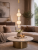 CARO ML0361 złota to elegancka lampa wisząca LED do salonu i sypialni. Ciepła barwa 3000K i szklane klosze zapewniają przyjemne, rozproszone światło.