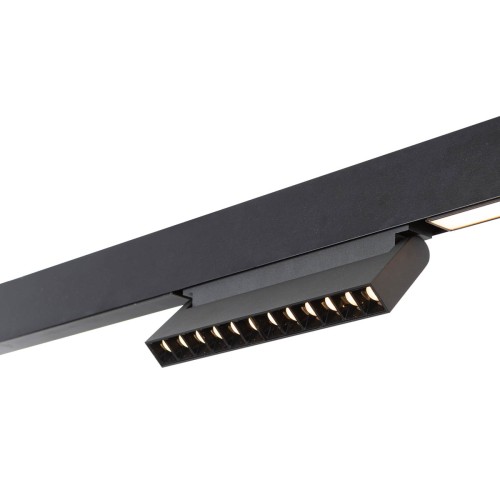 Oprawa Magnetic NORMAN 12W Italux to nowoczesne oświetlenie szynowe 48V w czarnym kolorze. LED OSRAM 3000K zapewnia ciepłe, przyjemne światło, idealne do salonu, kuchni i biura. Minimalistyczny design i łatwy montaż magnetyczny.