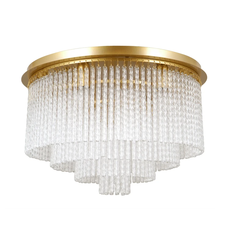 Nowoczesna lampa sufitowa NAUTE 50 cm w kolorze złotym z kryształowym wykończeniem. Oświetlenie zapewnia równomierne światło i elegancki wygląd wnętrza.