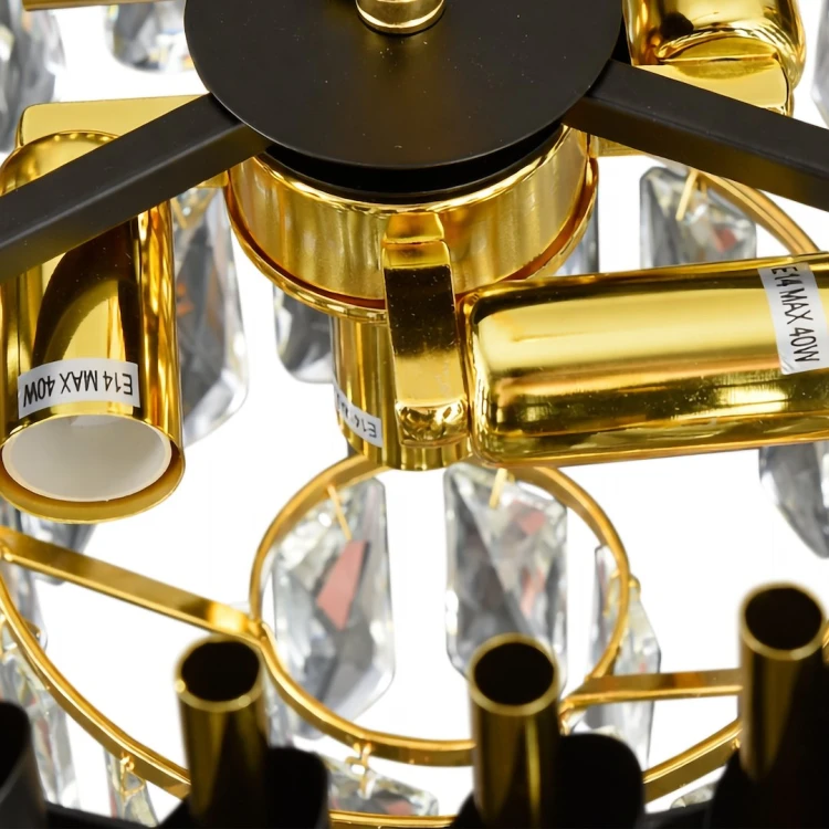 Stylowy żyrandol Cristal 7xE14 z kryształami i złotymi detalami to idealne oświetlenie do salonu. Średnica 48 cm i wysokość 90 cm zapewniają efektowny wygląd i funkcjonalność w każdym wnętrzu.