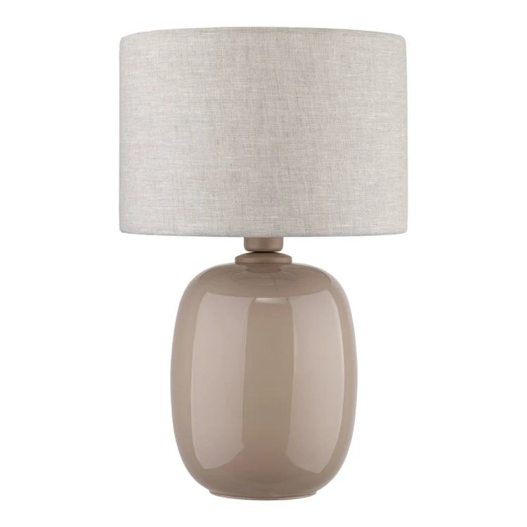 Lampka stołowa MELODY 16182 TK Lighting zachwyca naturalnym designem i beżową kolorystyką. Lniany abażur oraz szklana podstawa w odcieniu Sabia tworzą eleganckie oświetlenie do sypialni, salonu i wnętrz skandynawskich.