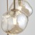 LAVA Sabia marki TK Lighting to propozycja dla miłośników stylu japandi i modern organic. Szklane klosze o nieregularnych kształtach pięknie rozpraszają światło i podkreślają wyjątkowy charakter wnętrza.
