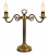 Lampa stołowa CEREUS 2xE14 Lemir to elegancka dekoracja inspirowana klasycznymi świecznikami. Wykończenie w kolorze patyny oraz możliwość zastosowania żarówek filamentowych płomyk tworzą wyjątkowy klimat w salonie, sypialni i gabinecie
