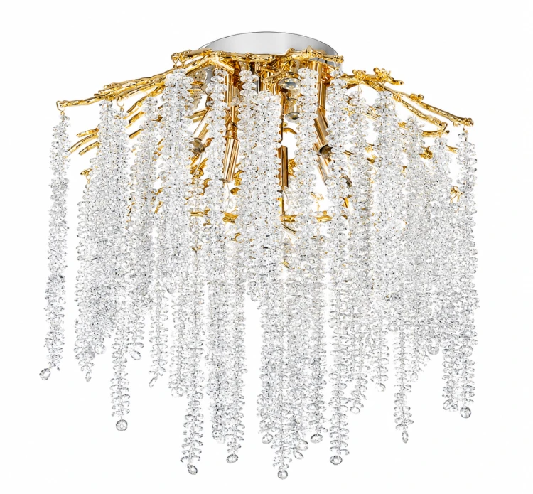 Lampa sufitowa FIORITO 6xE14 + 3x3W LED to wyjątkowy plafon glamour ze złotą konstrukcją i kaskadami transparentnych kryształów. Dodatkowe diody LED 6500K tworzą efektowne zimne podświetlenie, podkreślając blask kryształów