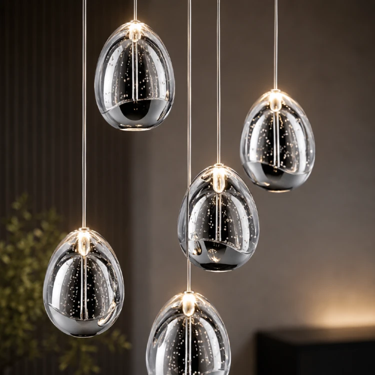 HUELTO Italux 24W LED to elegancka lampa kaskadowa z pięcioma kloszami wypełnionymi pęcherzykami powietrza. Ciepłe światło 3000K, strumień 1450 lm oraz chromowane wykończenie sprawiają, że wnętrze nabiera nowoczesnego i luksusowego charakteru.