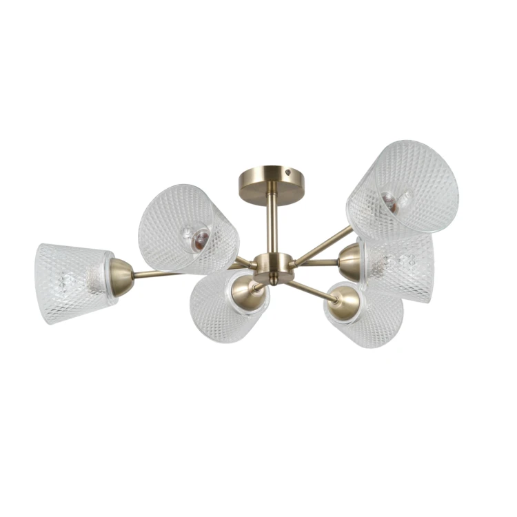 Lampa sufitowa LAMIN 6xE27 Italux zachwyca złotą oprawą i sześcioma dekoracyjnymi kloszami. Średnica 66 cm i wysokość 20 cm sprawiają, że doskonale pasuje do salonu, jadalni, sypialni lub eleganckiego holu.