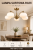 Lampa sufitowa FOLTE 5xE27 to klasyczne oświetlenie z białymi kloszami i oprawą w kolorze złotej patyny. Łukowe ramiona nadają jej elegancji, a pięć źródeł światła zapewnia dobre oświetlenie większego pomieszczenia
