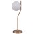 Lampka stołowa CARIMI Italux TB-3300-1-HBR łączy miodowy mosiądz z białym szklanym kloszem w kształcie kuli. Ma 60 cm wysokości, 20 cm szerokości i oprawkę G9. Doskonała na stolik nocny, biurko lub komodę.