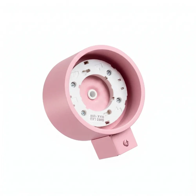 Różowa lampa ścienna MODO 1xGX53 Sollux SL.2465 łączy minimalistyczny kształt z pastelowym kolorem. Kinkiet można zamontować przy łóżku lub biurku. Niewielka konstrukcja 10 × 12 × 6 cm nie przytłacza aranżacji pokoju.