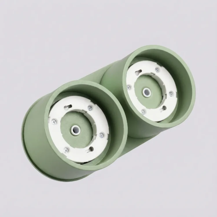 Lampa sufitowa MODO Sage Sollux SL.2471 łączy dwie cylindryczne oprawy GX53 z pastelową zielenią inspirowaną naturą. Sprawdzi się w pokoju dziecięcym, sypialni, garderobie lub korytarzu. Żarówki nie są dołączone.