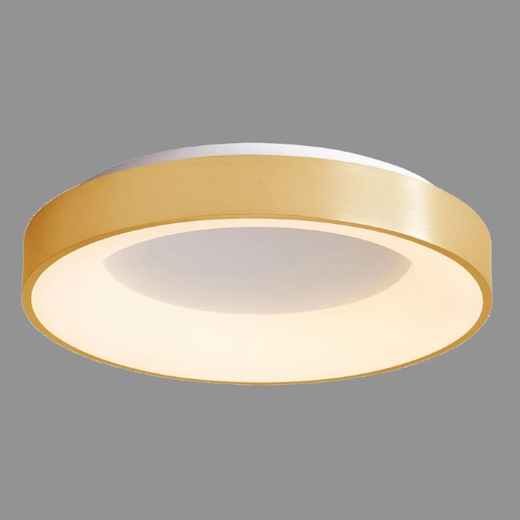 Złota lampa sufitowa GIULIA LED 50W łączy elegancki wygląd z montażem bezpośrednio przy suficie. Duży ring o średnicy 60 cm i ciepła barwa 3000K tworzą przytulne oświetlenie do salonu, kuchni, sypialni lub jadalni.