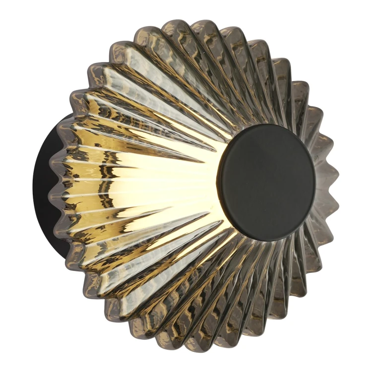 Kinkiet i plafon LED PADRE ML2794 to kompaktowa lampa 2 w 1 o średnicy 15 cm. Czarna oprawa z dekoracyjnym szklanym kloszem emituje ciepłe światło 3000 K. Moc 6 W, strumień 360 lm i montaż na ścianie lub suficie.