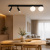Lampa SIRIO MLP8406 marki Milagro ma pięć punktów świetlnych G9 oraz eleganckie, mlecznobiałe klosze. Podłużna czarna oprawa o szerokości 64 cm pasuje nad stół, wyspę i barek. Idealna do salonu, jadalni, kuchni lub gabinetu.