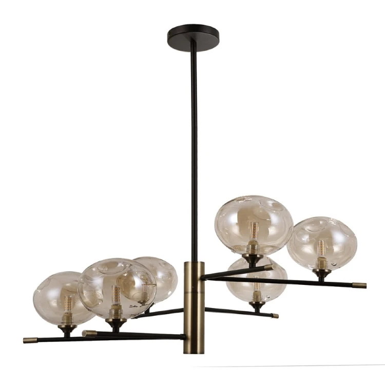 Nowoczesna lampa sufitowa MESTA marki Italux zachwyca sześcioma nieregularnymi kloszami z bursztynowego szkła. Rozłożysta oprawa 72 × 72 cm sprawdzi się jako lampa nad stół, centralne oświetlenie salonu lub dekoracja wysokiego holu.