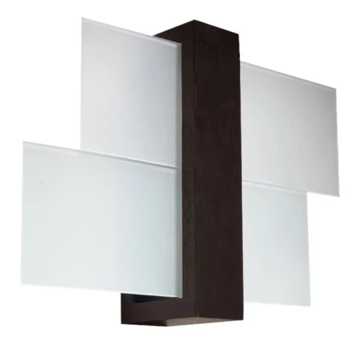 Kinkiet FENIKS 1xE27 wenge Sollux SL.0075 łączy ciemne drewno z geometrycznie ułożonym szkłem. Lampa ścienna o wymiarach 43 × 12 × 30 cm pasuje do salonu, sypialni, korytarza lub holu. Żarówkę należy dokupić osobno.