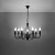 Elegancki żyrandol MINERWA 7xE14 w czarnym kolorze pasuje do wnętrz klasycznych, loftowych, glamour i modern classic. Stalowa lampa Sollux ma siedem punktów światła oraz efektowną formę świecznika. Żarówki nie są dołączone.