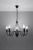 Elegancki żyrandol MINERWA 5xE14 w czarnym kolorze pasuje do wnętrz klasycznych, loftowych, glamour i modern classic. Stalowa lampa Sollux SL.0218 ma pięć punktów światła oraz dekoracyjną formę świecznika. Żarówki nie są dołączone.