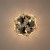 Lampa sufitowa glamour ESMERALDA to połączenie białej tkaniny, chromowanego metalu i kryształowych kwiatów. Trzy wymienne źródła światła E14 zapewniają równomierne oświetlenie. Plafon do salonu, sypialni i pokoju dziecka.