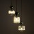 Lampa SOPHIA 11148 z 3 punktami światła E14 to dekoracyjne oświetlenie do eleganckich wnętrz. Ryflowane klosze w kolorze koniakowym i zielone szklane kule tworzą efektowną kaskadę