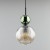 Pojedyncza lampa wisząca SOPHIA 11145 pasuje nad blat, wyspę, barek lub stolik nocny. Koniakowy szklany klosz, zielona kula i czarne elementy tworzą eleganckie połączenie w stylu glamour.