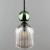 Pojedyncza lampa wisząca SOPHIA 11146 pasuje nad blat, wyspę, barek lub stolik nocny. Koniakowy szklany klosz, zielona kula i czarne elementy tworzą eleganckie połączenie w stylu glamour.